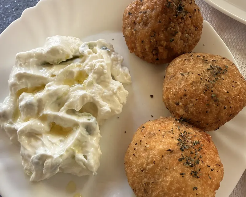 Qifqi rice balls with a garlic yoghurt dip